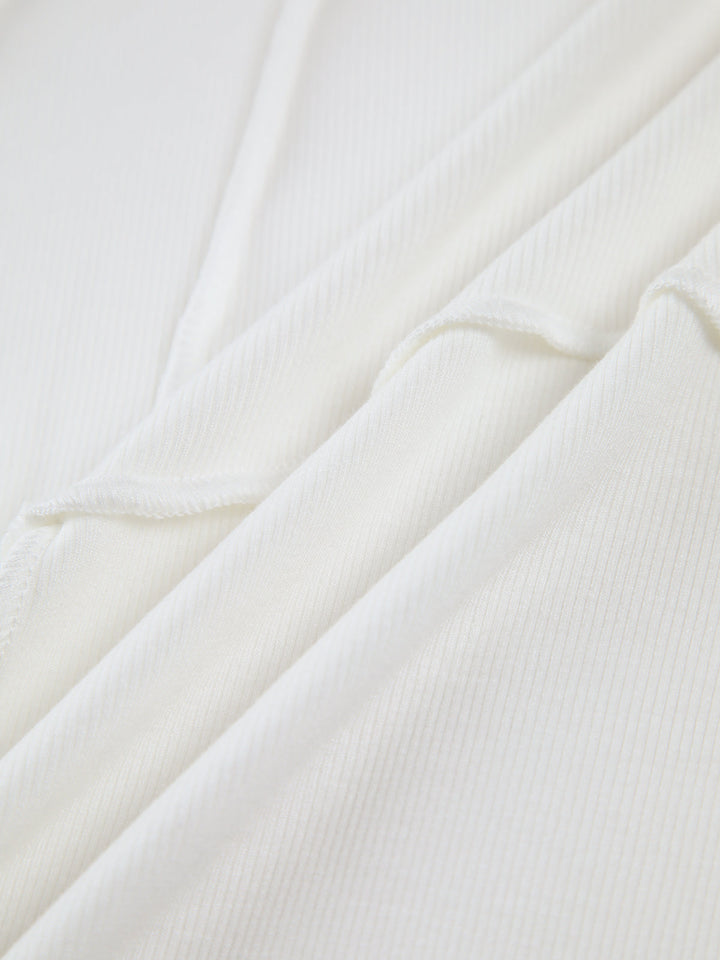 Mia™| Top manica lunga con piping di base